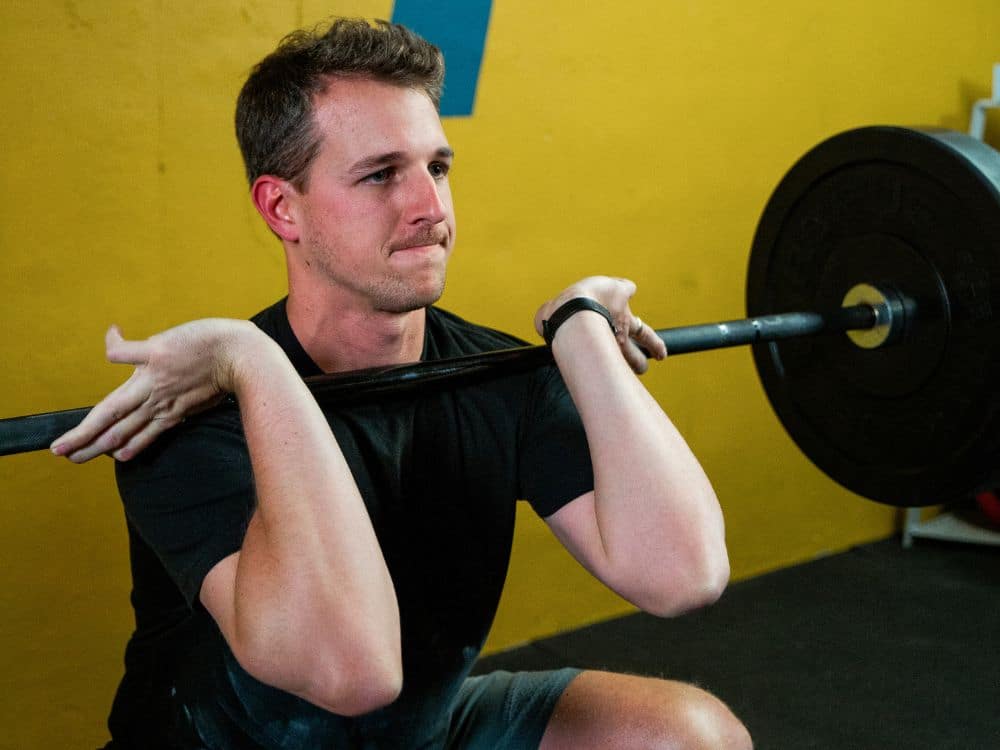 A member of Parris Performance Institute lifting
