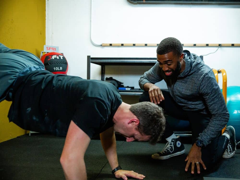 Coach Joshua Parris of Parris Performance Institute coaching a member during a sports performance training session