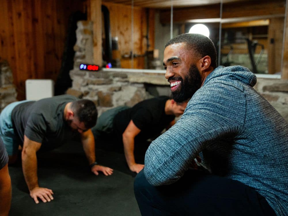 Coach Joshua Parris of Parris Performance Institute coaching members during a small group training class